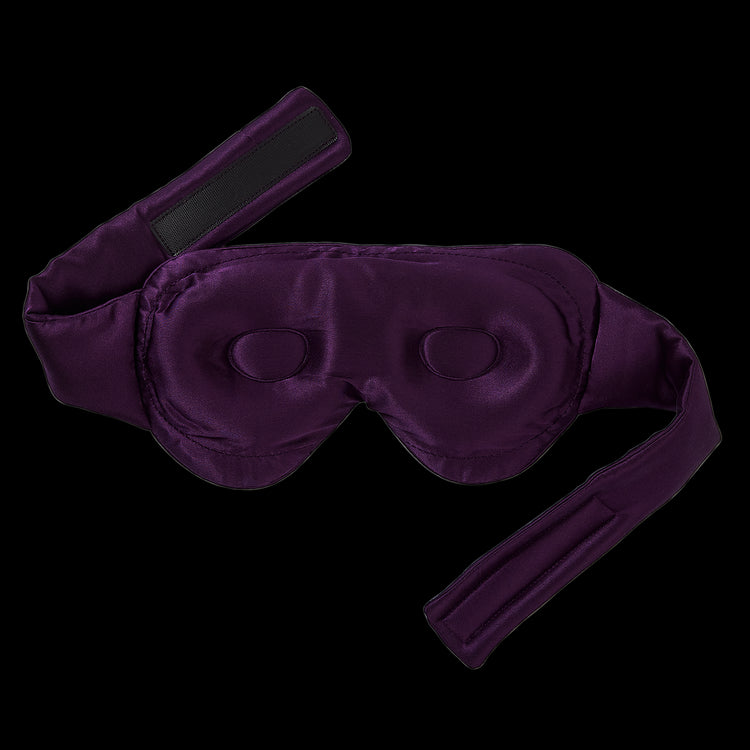 Dream Sleep Silk Eye Mask by KAILU x Dr. Andrea Matsumura in Aubergine, showing 3D optical cushion to accommodate eyelash extensions and/or gentle pressure on temples and ears, on a transparent background