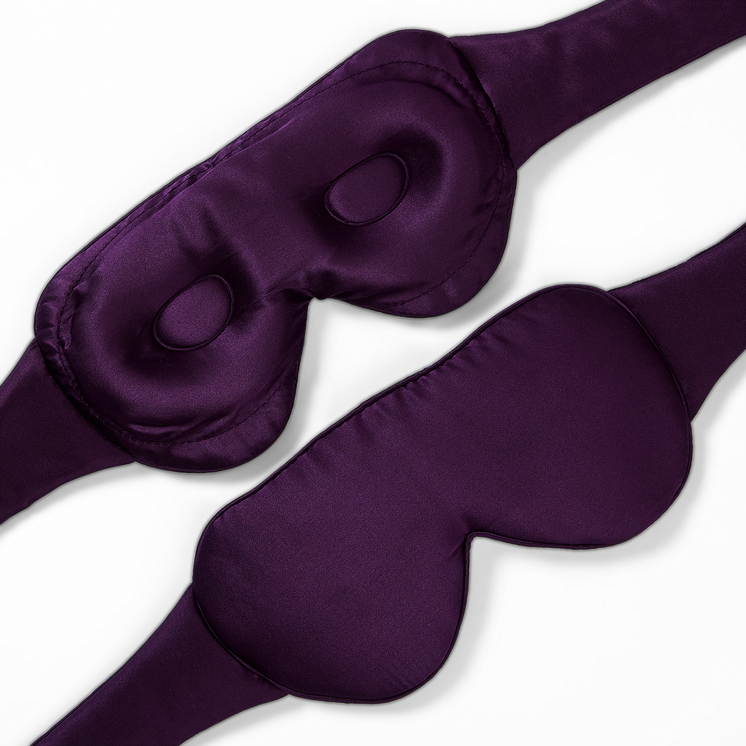 Dream Sleep Silk Eye Mask by KAILU x Dr. Andrea Matsumura in Aubergine silk, showing 3D optical cushion to accommodate eyelash extensions and/or gentle pressure on temples and ears, on a transparent background