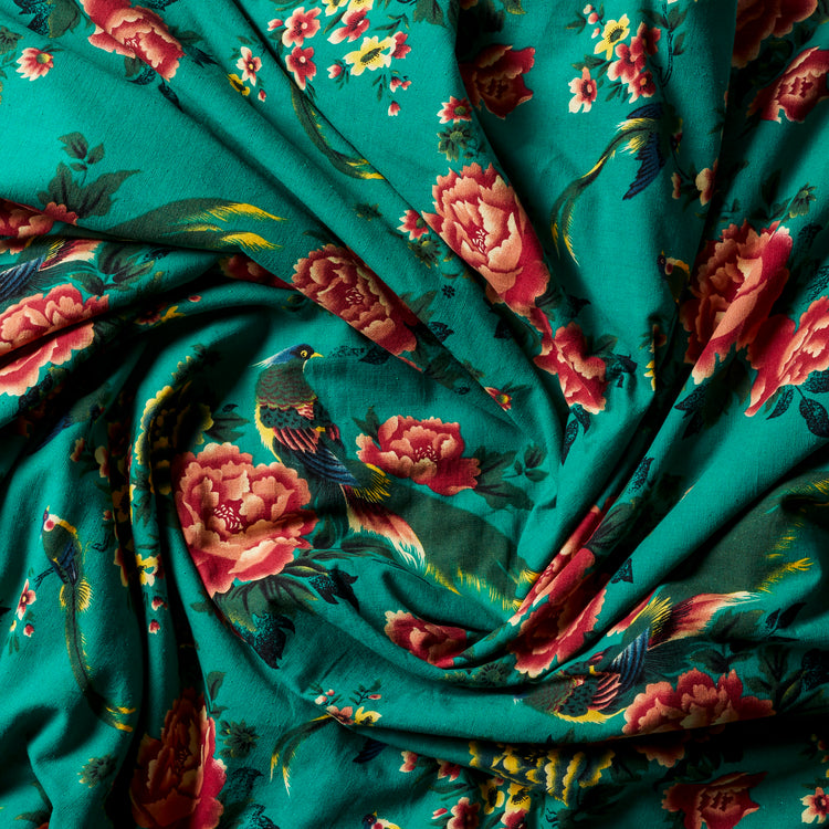 Open Road Portable Throw comes in a vintage 1950s Shanghai peony and bird print on vibrant emerald linen fabric